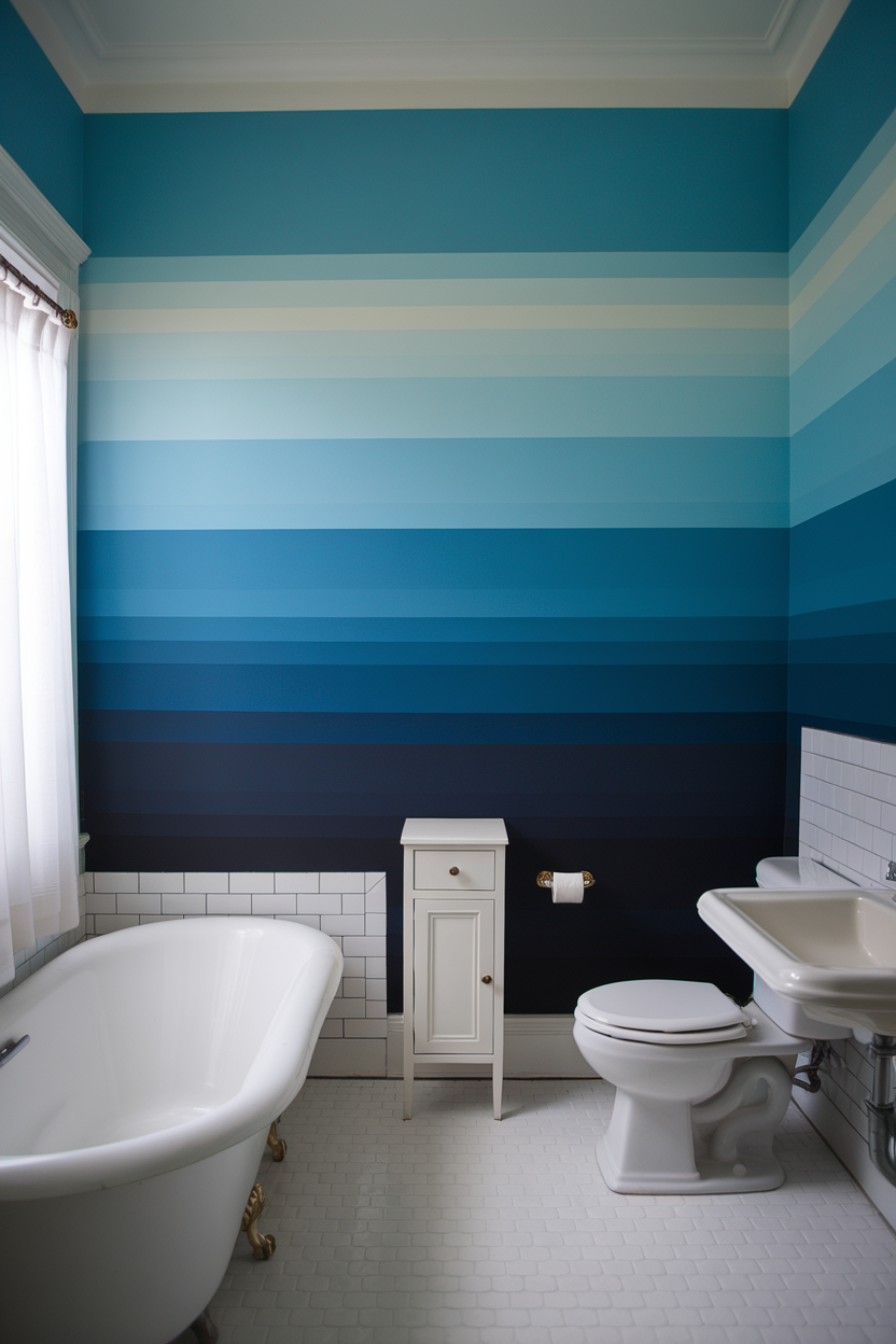 Bathroom with ombre wall paint in shades of blue, featuring a freestanding bathtub and white fixtures.
